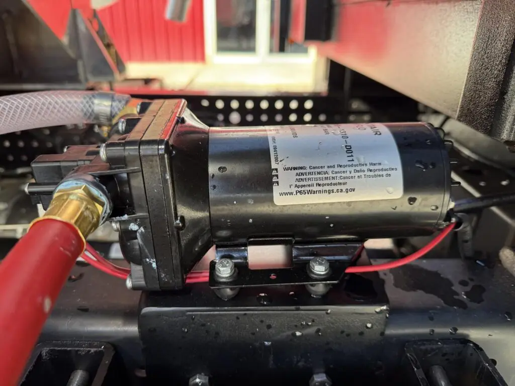 N3103 - 2025 Isuzu NRR with 895 gal PRT and 12’ Flatbed_01