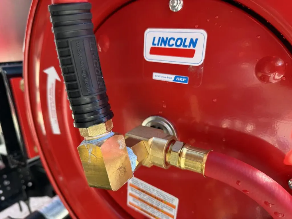 N3103 - 2025 Isuzu NRR with 895 gal PRT and 12’ Flatbed_01