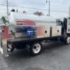 2025 Isuzu NRR Gas with Muskogee Tank Model 999 Round Tank / Portable Restroom Truck